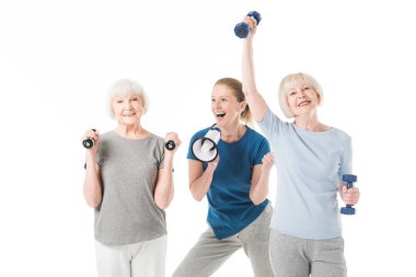 Dambıl ve üzerinde beyaz izole megafon ile Koç ile Sportswomen