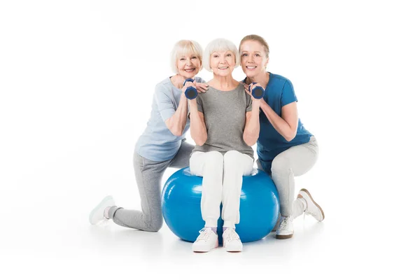 Three Sportswomen Dumbbells Fitness Ball Isolated White — Stock Photo, Image