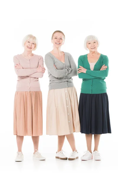 Drie Stijlvolle Vrouwen Met Gekruiste Armen Geïsoleerd Wit — Stockfoto