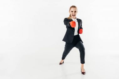 businesswoman screaming in suit and red gloves isolated on white clipart