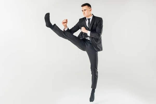 Businessman Jumping Performing Kick Suit Isolated White — Stock Photo, Image