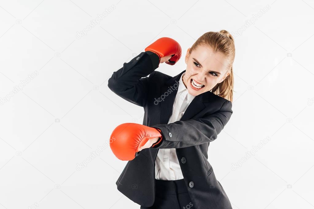 businesswoman screaming in suit and gloves isolated on white