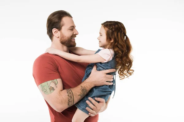 父亲手持小女儿在白色的手上的侧面视图 — 图库照片