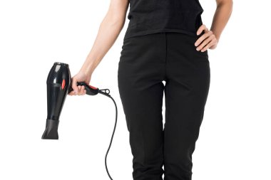 Kuaför Saç kurutma makinesi üzerinde beyaz izole tutarak yakından görmek