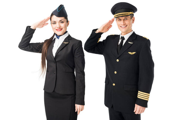 Airline captain and stewardess saluting isolated on white