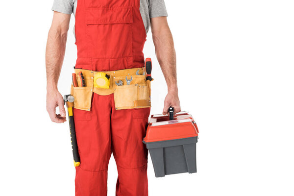 Крупный план рабочего с ящиком инструментов, изолированным на белом
