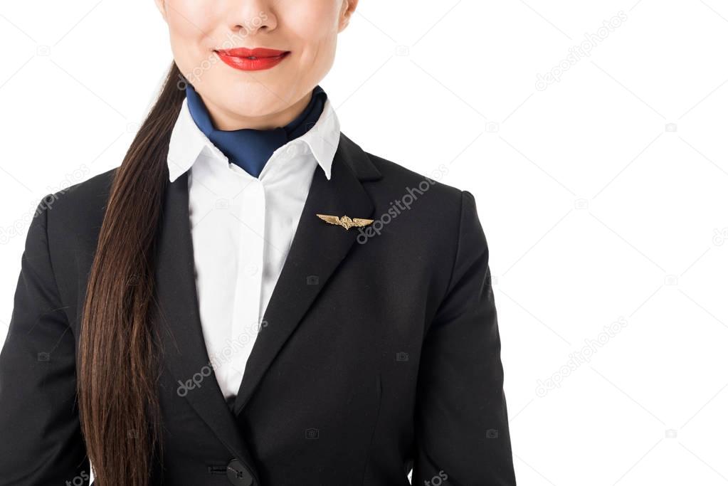 Close-up view of stewardess in uniform isolated on white