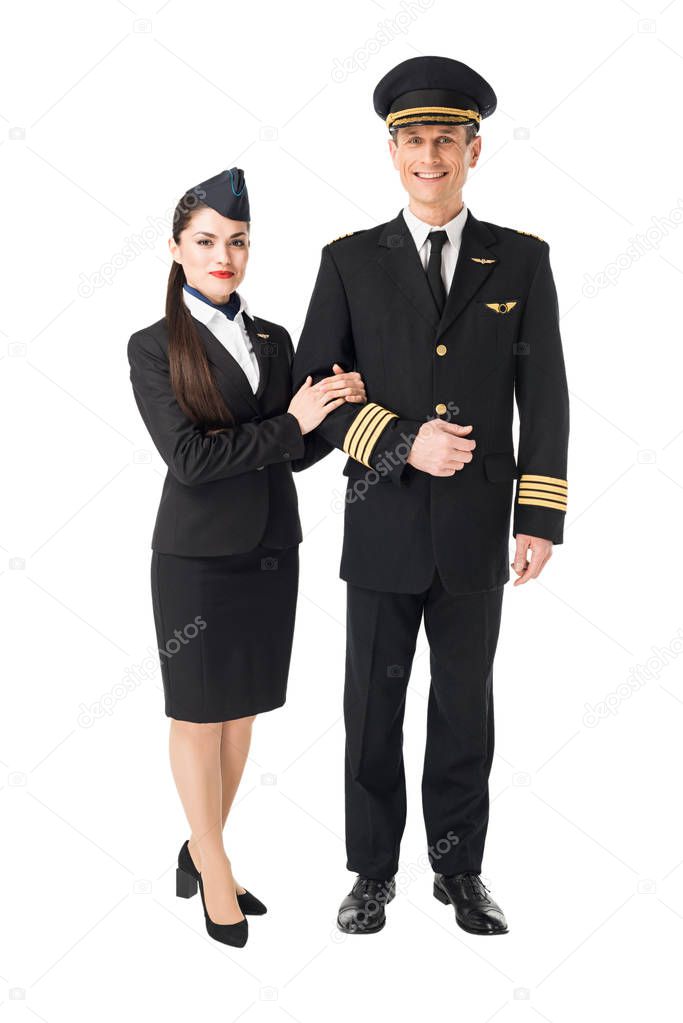 Airline crew stewardess and pilot isolated on white