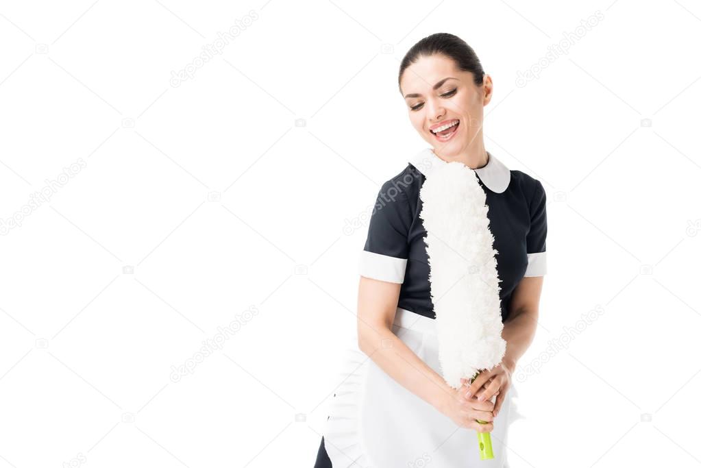 Happy maid singing in duster isolated on white