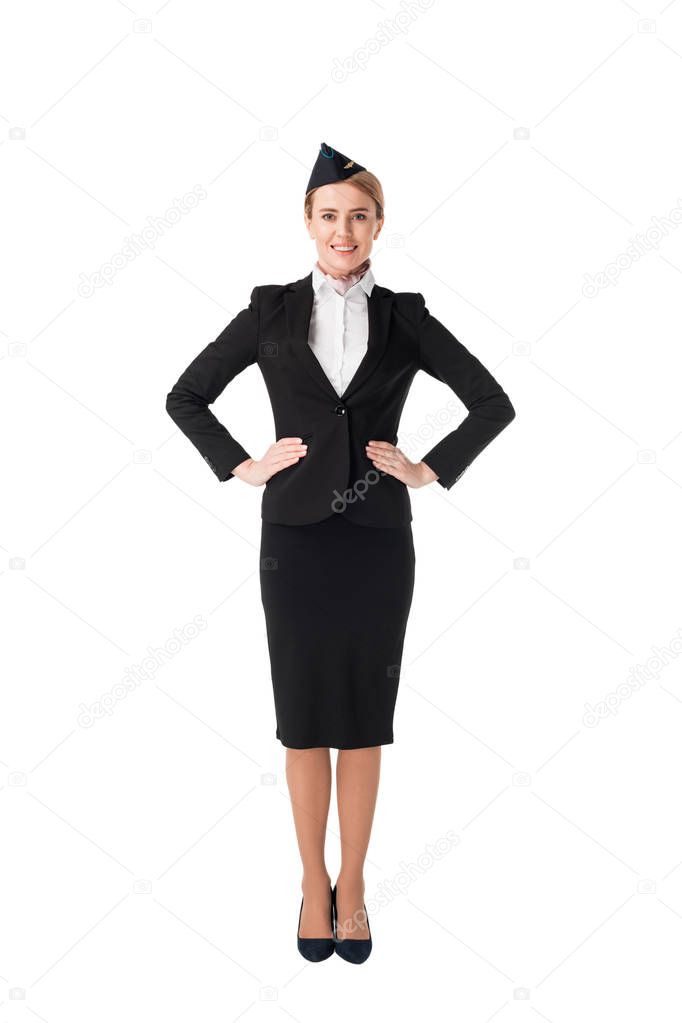 Smiling young stewardess in uniform isolated on white