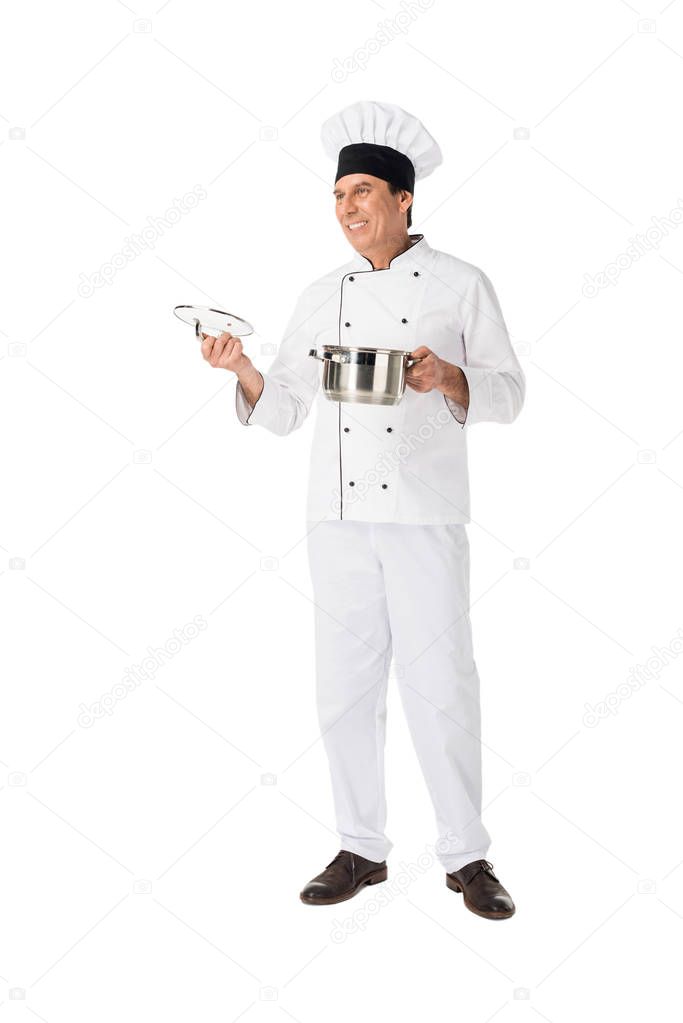 Professional cook holding pan isolated on white