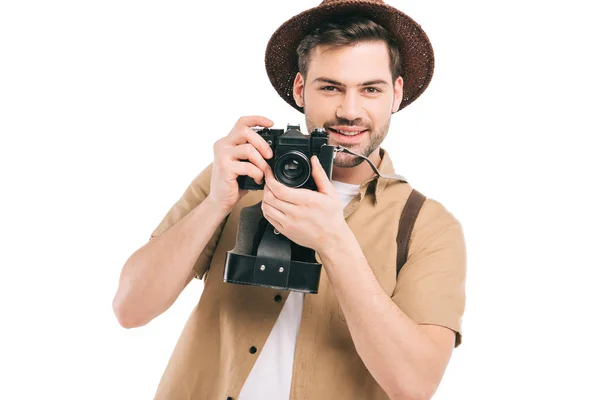 Guapo Joven Sonriente Sombrero Sosteniendo Cámara Aislada Blanco — Foto de Stock