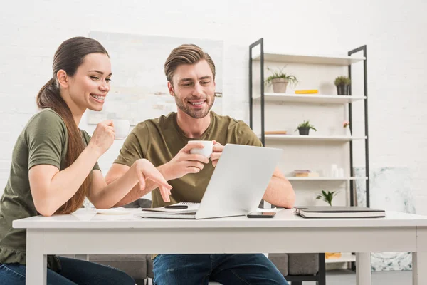 Young Happy Couple Drinking Coffee Working Laptop Together Home — Stock Photo, Image