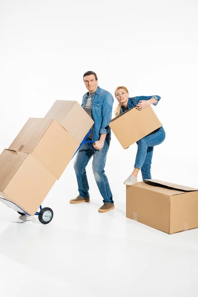 Young Couple Moving Cardboard Boxes Trolley Cart Isolated White — Stock Photo, Image