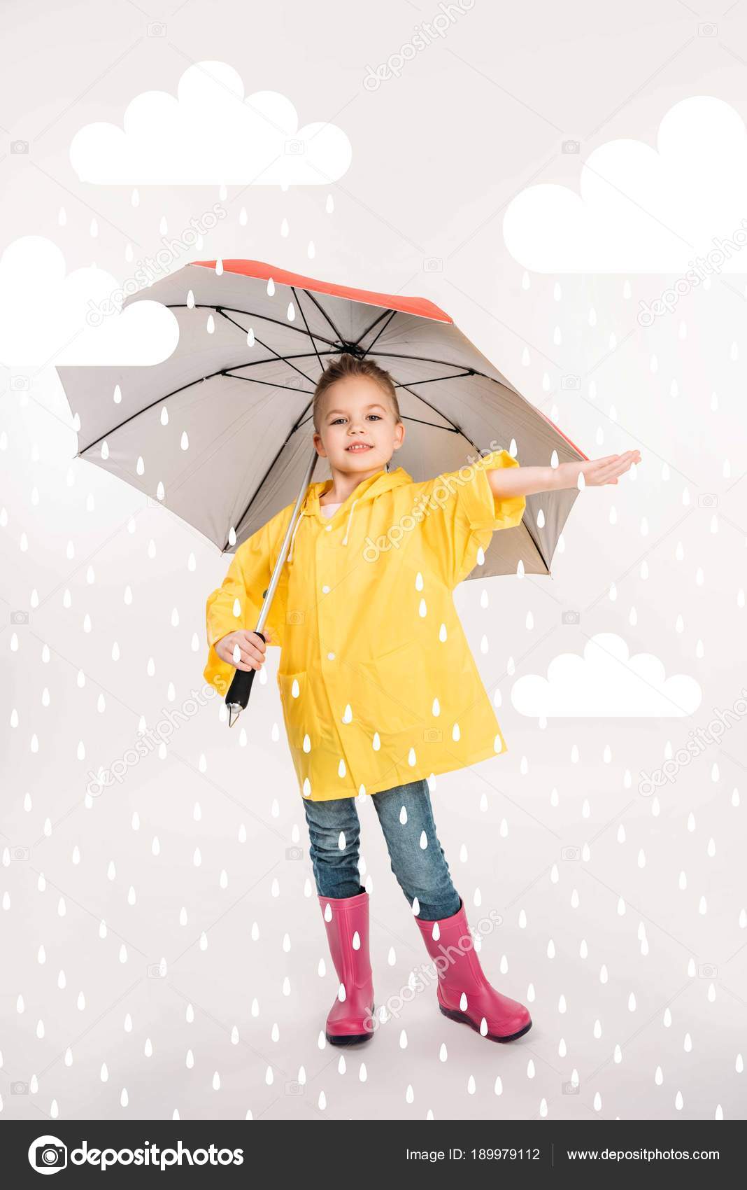 Raincoat In Rain And Umbrella