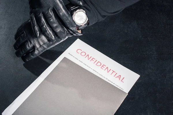 Robber Confidential Documents Checking His Watch — Stock Photo, Image