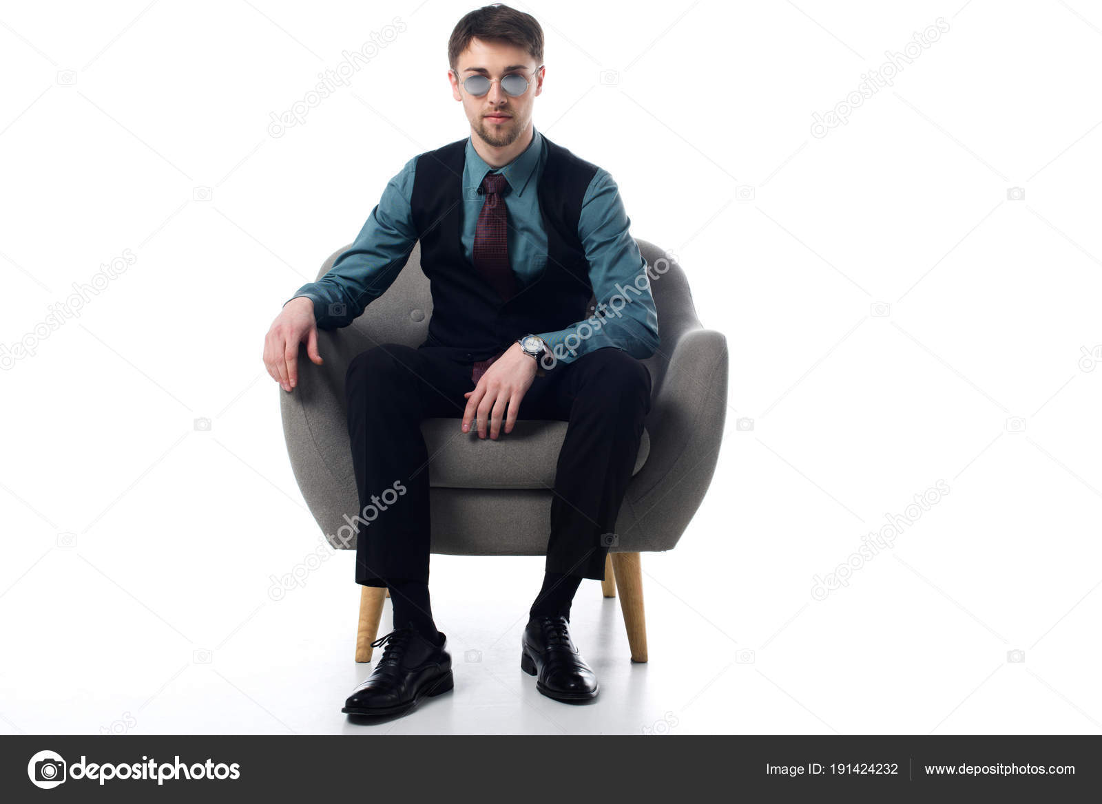 sitting in armchair