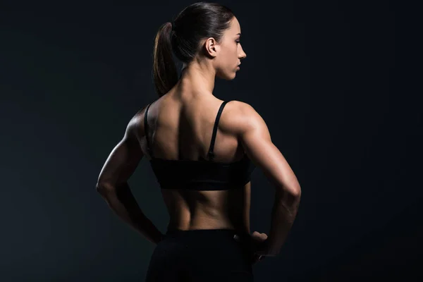 Rückenansicht Der Schönen Bodybuilderin Mit Muskulösem Körper Sportbekleidung Isoliert Auf — Stockfoto