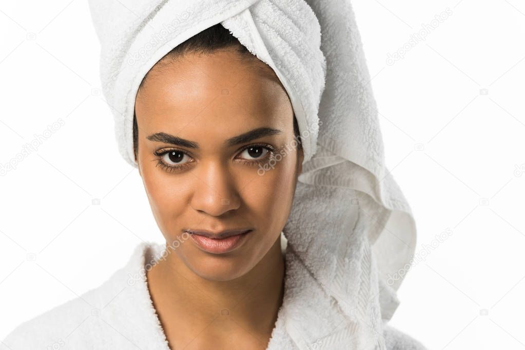 attractive african american woman in bathrobe and towel with perfect skin,  isolated on white