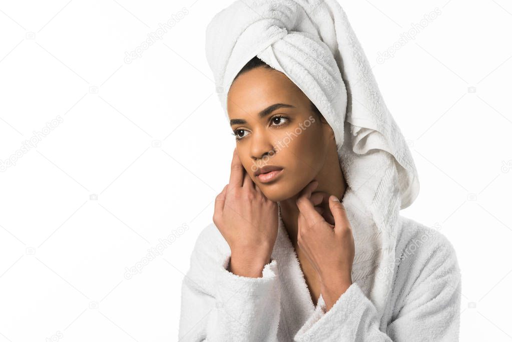 tender african american woman in bathrobe and towel with perfect clean skin,  isolated on white