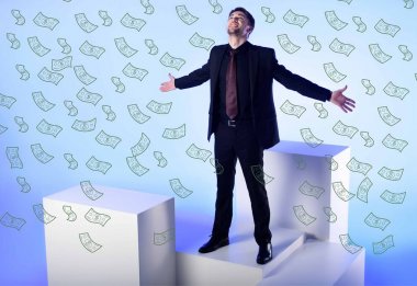 businessman in black suit with outstretched arms standing on white block with falling dollar banknotes on blue clipart