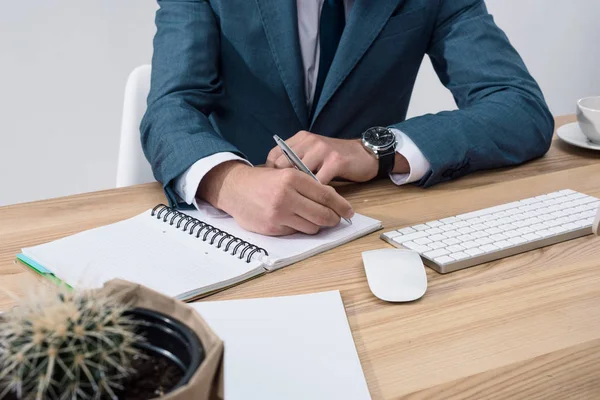 Young businessman at workplace — Stock Photo