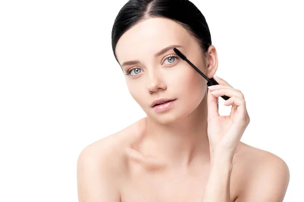 Woman applying mascara — Stock Photo