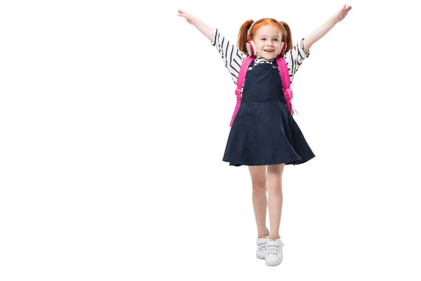 Happy schoolgirl in headphones — Stock Photo