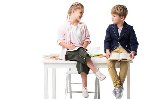 Adorable schoolkids studying together — Stock Photo