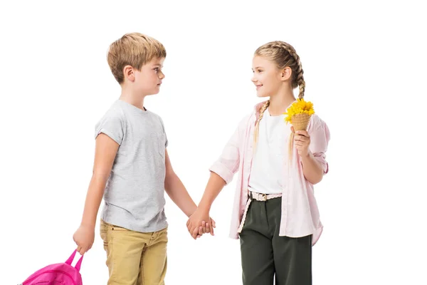 Niño y niña con flores - foto de stock