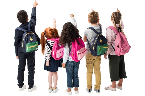 Multiethnic children with backpacks — Stock Photo