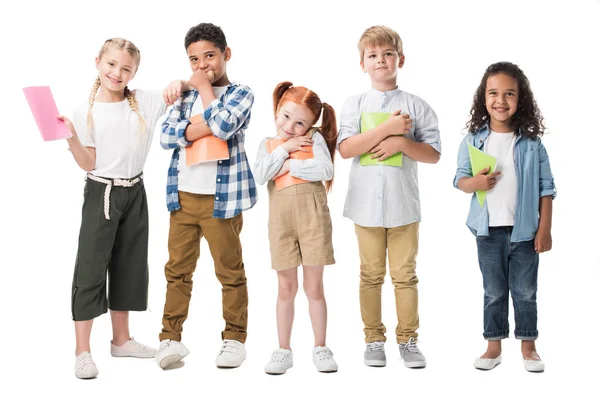 Multiethnic children with textbooks — Stock Photo