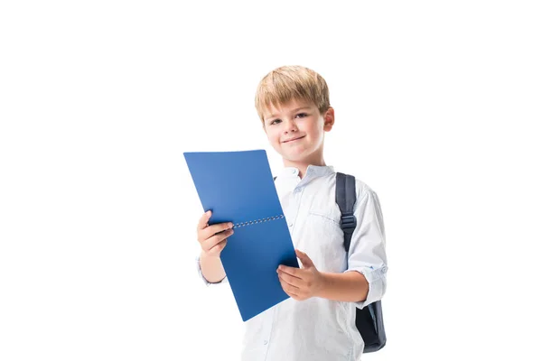 Écolier tenant un carnet — Photo de stock