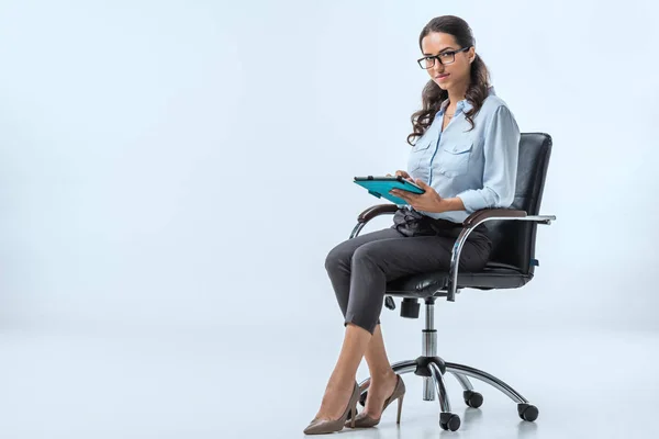 Businesswoman using digital tablet — Stock Photo