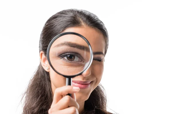 Businesswoman holding magnifying glass — Stock Photo