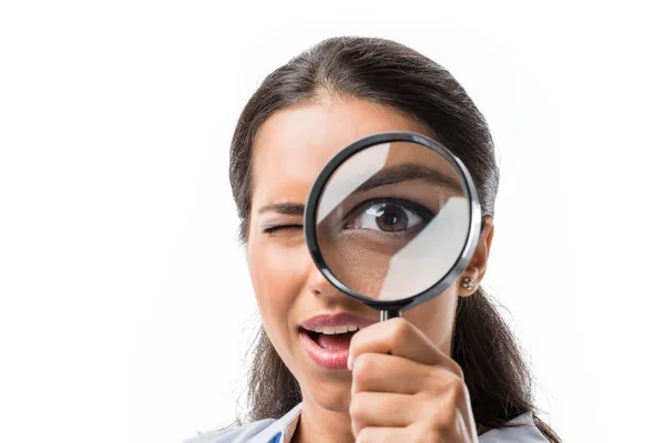 Businesswoman holding magnifying glass — Stock Photo