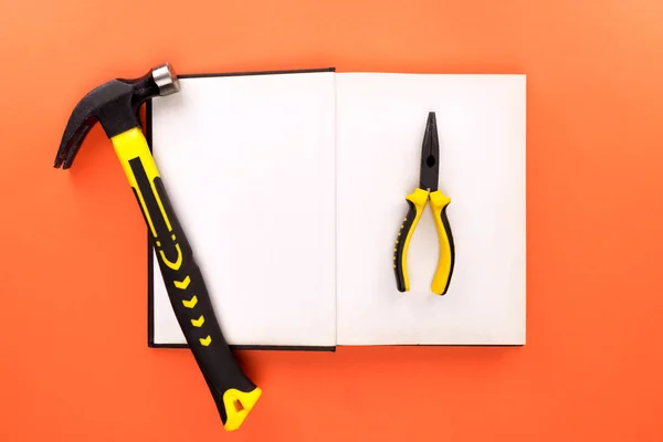 Open book and tools — Stock Photo