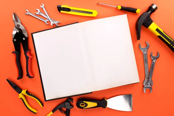 Open notebook and tools — Stock Photo