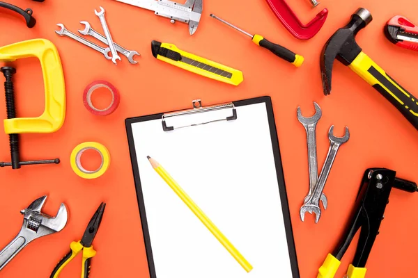 Clipboard and reparement tools — Stock Photo