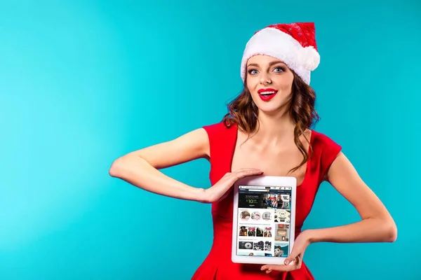 Tablet and amazon website on christmas — Stock Photo