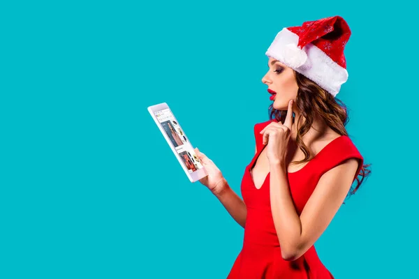 Santa girl with digital tablet — Stock Photo