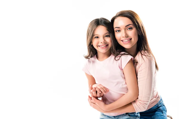 Mother hugging daughter — Stock Photo