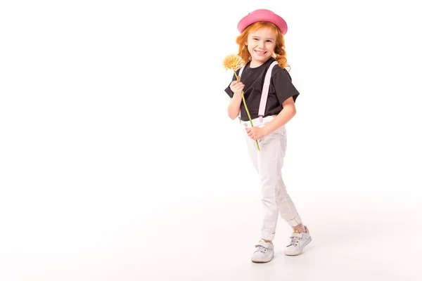 Smiling kid holding flower on white — Stock Photo