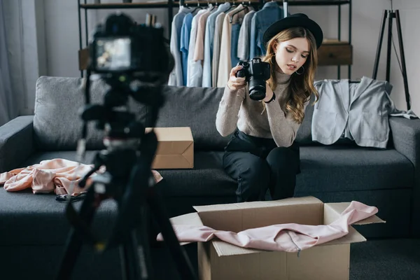 Young fashion blogger recording video about dress for new vlog — Stock Photo