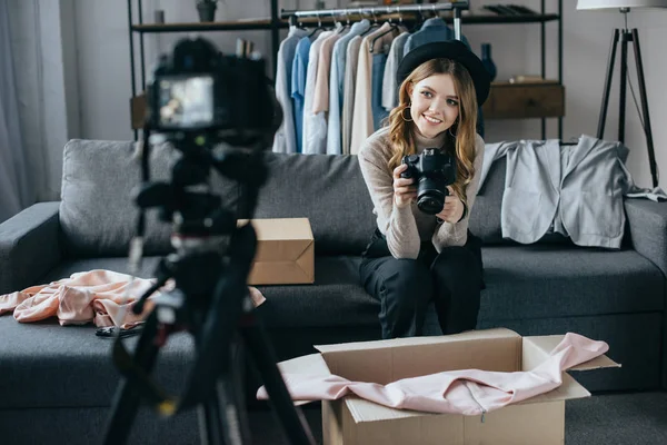 Happy fashion blogger recording new vlog about dress — Stock Photo