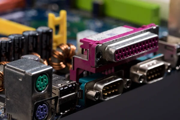 Close up view of computer motherboard colorful ports — Stock Photo