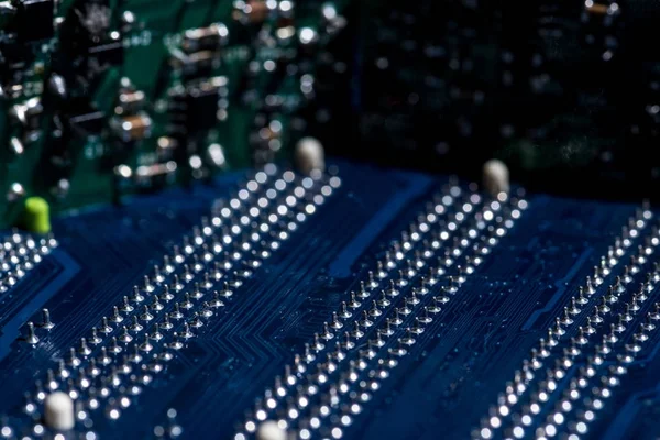 Selective focus of various details of computer motherboard — Stock Photo