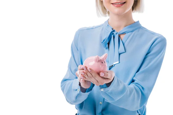 Cropped shot of woman holding piggy bank in hands isolated on white — Stock Photo