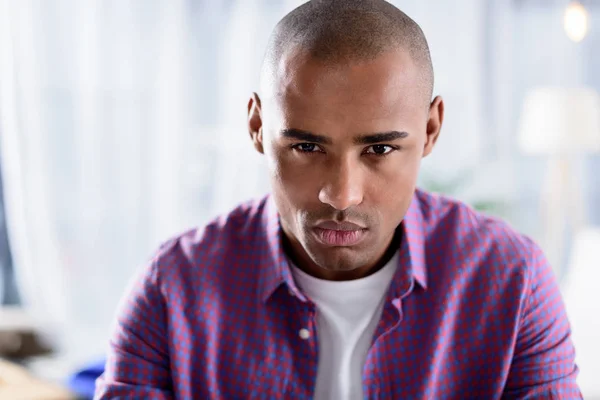 Serious african american man looking at camera — Stock Photo