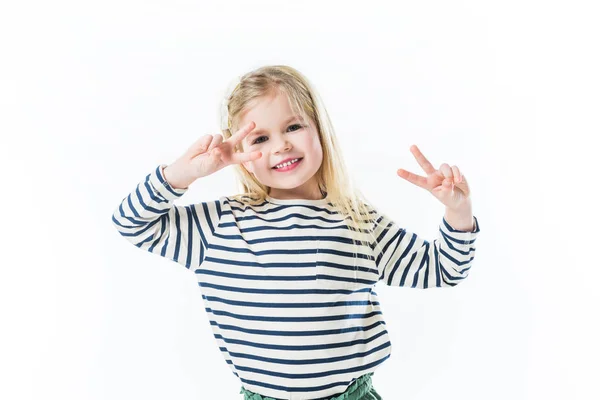 Усміхнена маленька дитина танцює і робить мирні жести руками ізольовані на білому — стокове фото